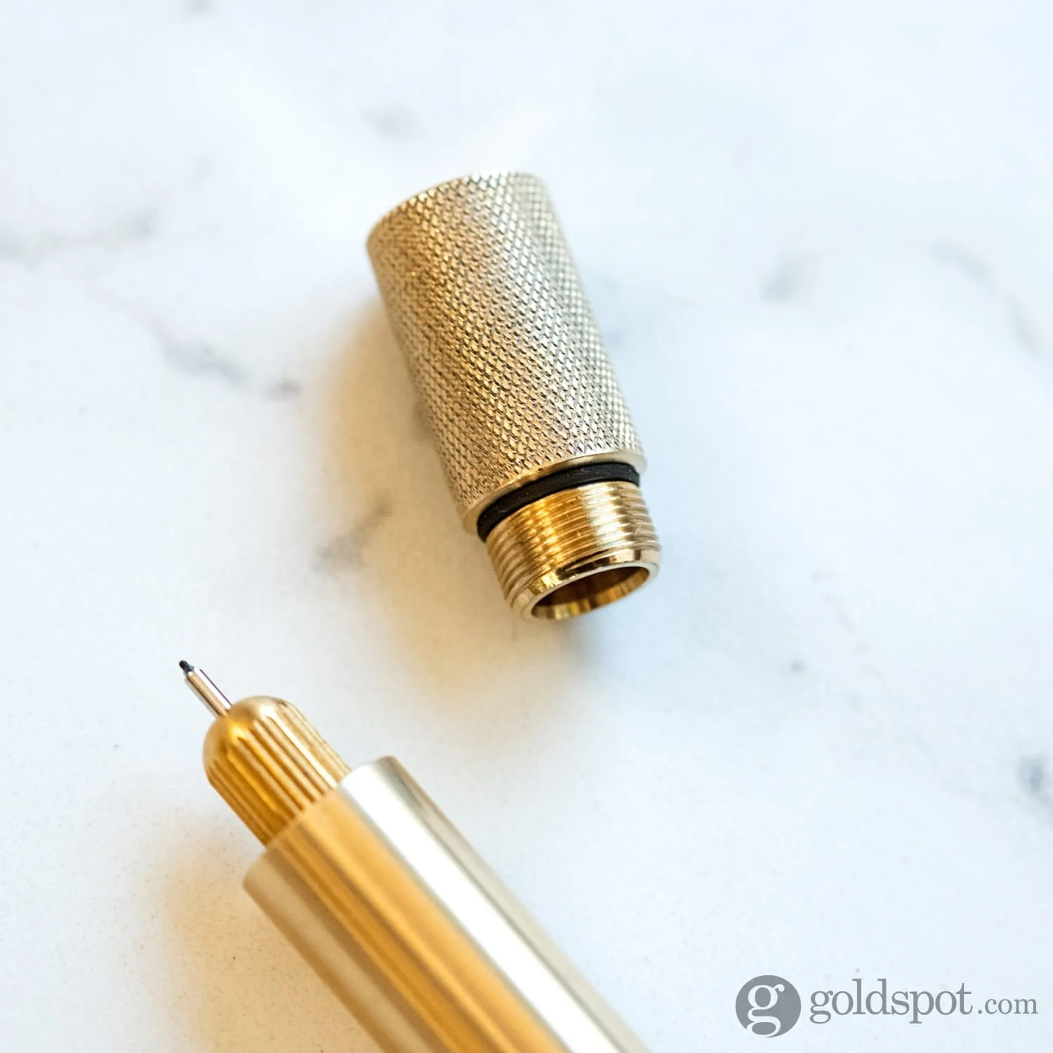 1222-tom-s-studio-lumos-refillable-mini-single-tip-pen-in-brass-special-edition-2.webp Tom's Studio Lumos Refillable Mini Single Tip Pen in Brass - Special Edition