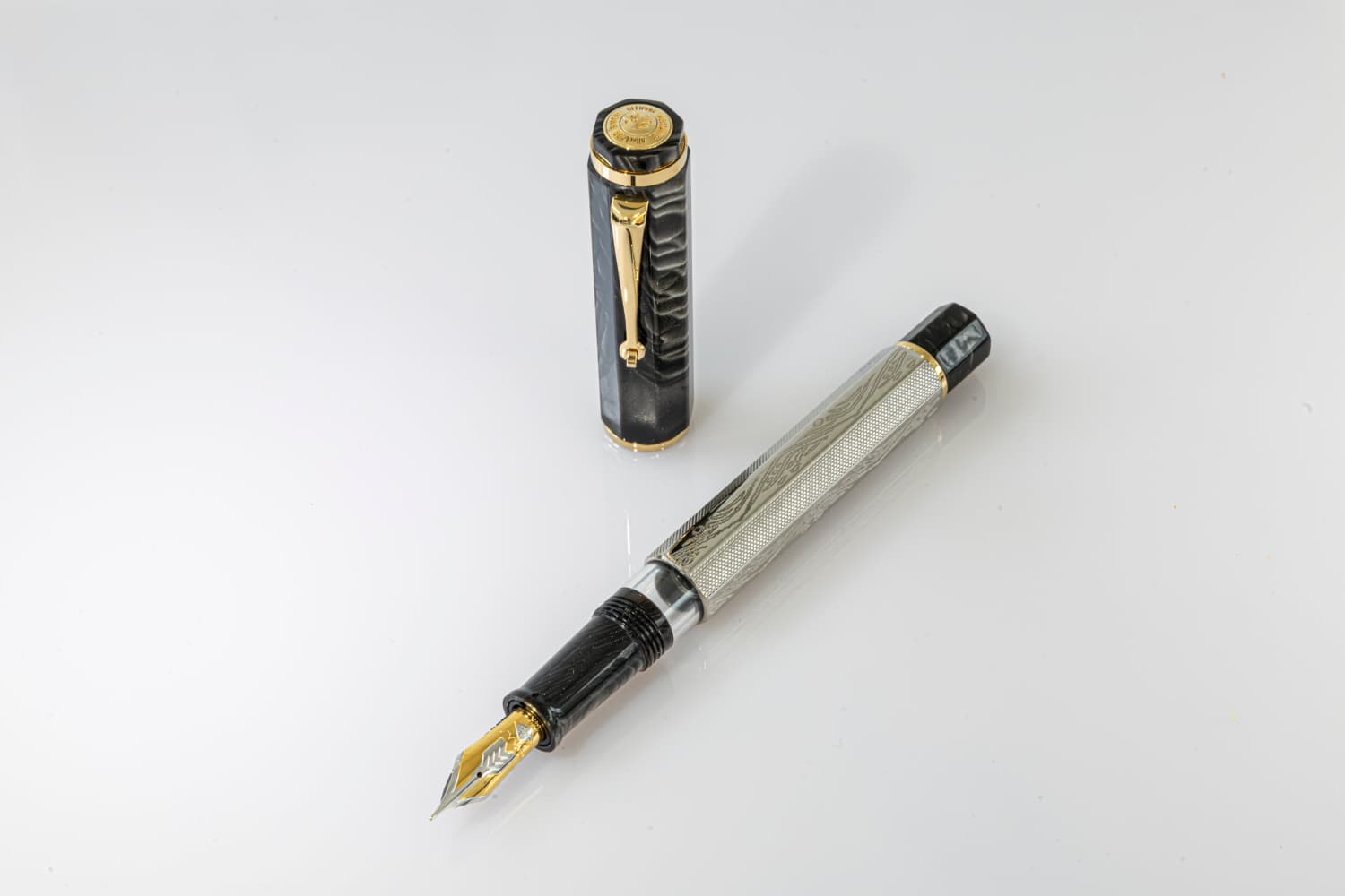 131-omas-cobra-fountain-pen-in-silver-guilloche-14k-1.jpg Omas Cobra Fountain Pen in Silver Guilloché - 14K