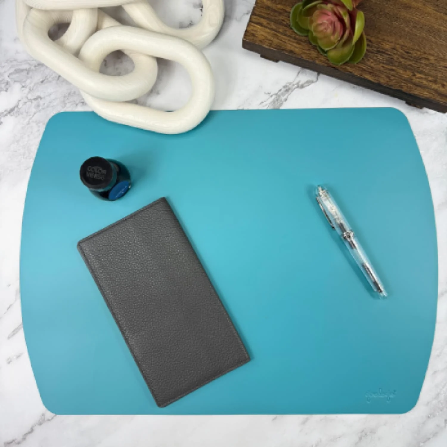 1574-girologio-repurposed-leather-writing-mat-in-teal-1.webp Girologio Repurposed Leather Writing Mat in Teal
