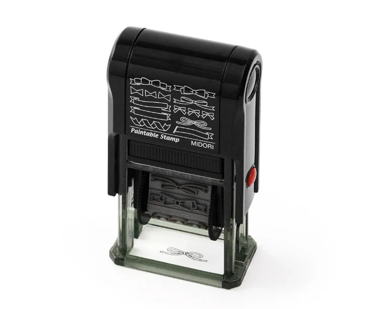 1654-midori-paintable-rotating-stamp-in-ribbon-2.webp Midori Paintable Rotating Stamp in Ribbon