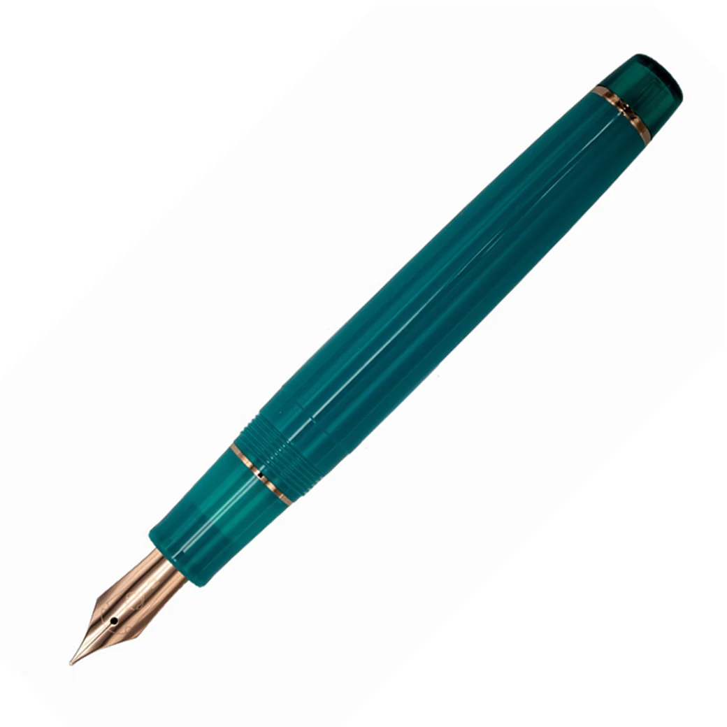 1893-sailor-pro-gear-regular-fountain-pen-in-lucky-charm-2-translucent-clover-teal-3.webp Sailor Pro Gear Regular Fountain Pen in Lucky Charm 2 Translucent Clover Teal