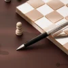 3351-caran-d-ache-leman-ballpoint-pen-in-damier-gift-set-with-leather-case-special-edition-3.webp Caran d'Ache Leman Ballpoint Pen in Damier Gift Set with Leather Case - Special Edition